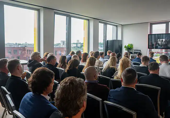 Visitors attending the BVB partner event at the ATZ Group office sitting in the audience