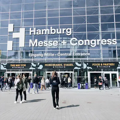 ATZ Group marketing employee walking towards the Hamburg Messe und Congress building