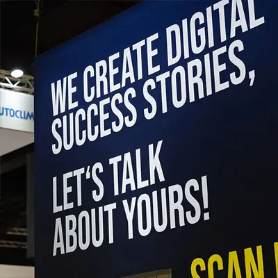 Trade fair banner featuring the ATZ Group slogan